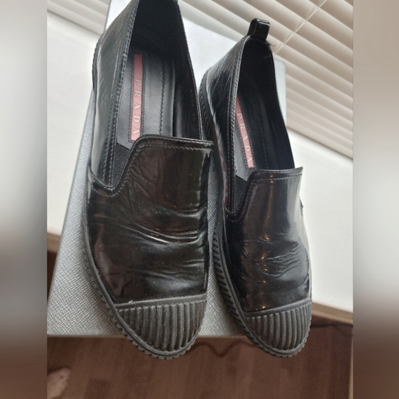 Gently loved Prada slip ons. Comes with dust bag and box. - Picture 1 of 4